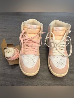 Jordan Nike Women’s High-Top Sneakers in Pinkand White